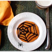 spooky pumpkin pancakes with black cinnmon syrup at TidyMom.net