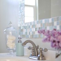 diy mosaic tile bathroom mirror at centsationalgirl.com