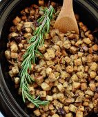 Slow Cooker Stuffing with artichokes, mushrooms and toasted pecans. Easy, flavorful and perfect for any holiday meal. Get the recipe at TidyMom.net