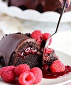 Chocolate Raspberry Bundt Cake with a surprise raspberry filling and a Chocolate Chambord Glaze will put any chocolate lover into a state of pure bliss. Get the full recipe at TidyMom.net