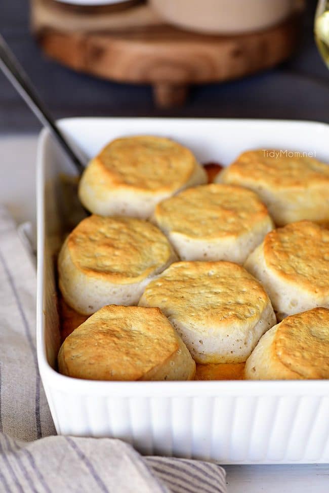 Chicken and Cheese Biscuit Bake in white baking dish on table