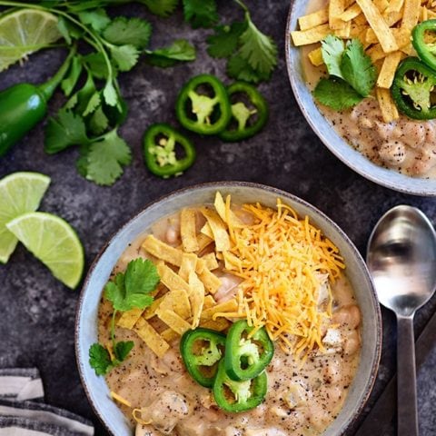 This family favorite white chili recipe is made with white chili beans, chicken, peppers, and lots of spices. It’s a hearty one pot meal that you can have on the table in under an hour, and it’s even better the next day! Print the full recipe for White Bean Chicken Chili at TidyMom.net