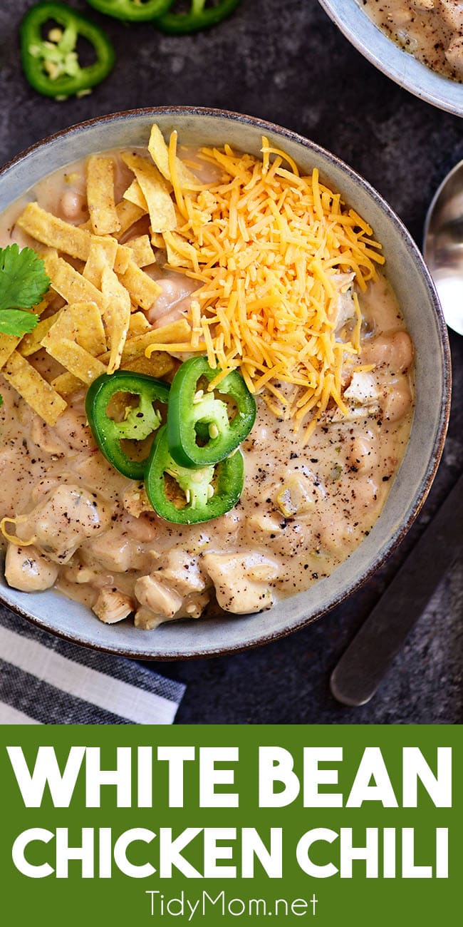 white bean chicken chili in a bowl with cheese