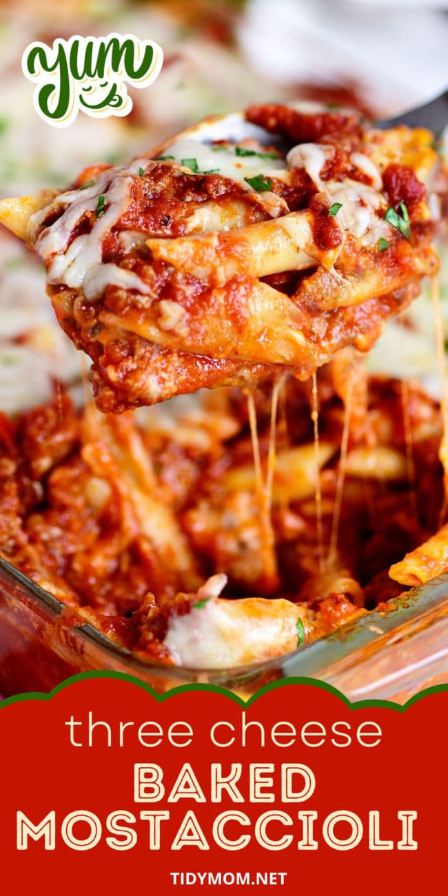 large serving spoonful of baked mostaccioli with pulls of melted cheese