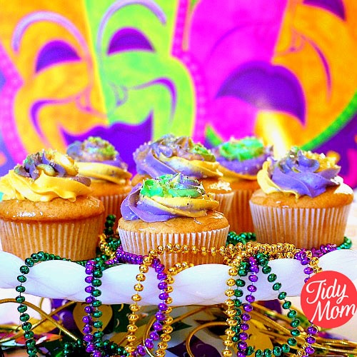 The King Cake might be the traditional sweet on Mardi Gras, but these fun cupcakes are decorated with traditional Mardi Gras colors: purple represents justice, green represents faith and gold represents power. French Vanilla Butter Rum Mardi Gras Cupcakes recipe at TidyMom.net