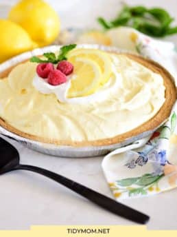 lemonade pie with lemon slices and fresh raspberries