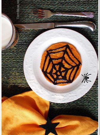 spooky pumpkin pancakes with black cinnmon syrup at TidyMom.net