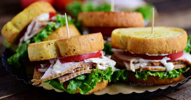 Turkey Caesar Sandwich. Easy homemade caesar dressing and garlic toast turns an ordinary cold-cut sandwich into something special. Perfect way to use up left-over Thanksgiving turkey or any day with deli sliced turkey! 