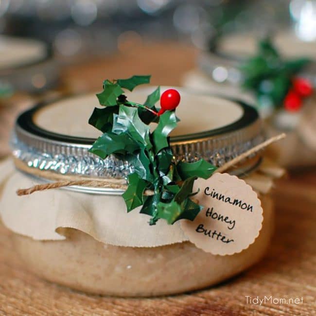 Delicious handmade food gift that requires no baking! Cinnamon Honey Butter makes a beautiful gift in a jar when paired with homemade bread or pound cake. Get the easy recipe + gift jar tutorial at TidyMom.net