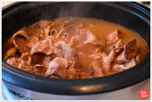Day 1 cook the roast in the oven + Day 2 slice and slow cook in juices = Delicious Italian Beef recipe at TidyMom.net
