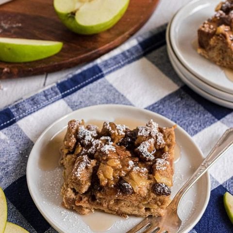 bread pudding on a plate with a fork