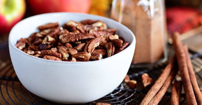 toasted pecans in white bowl