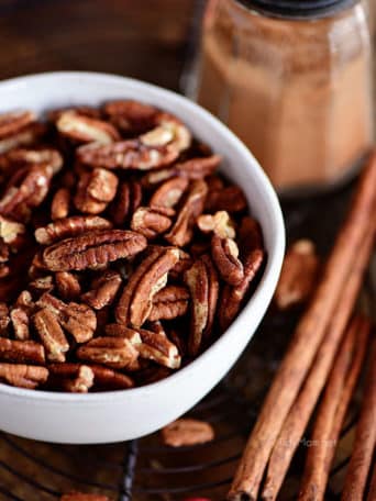 close up of toasted pecans with cinnamon