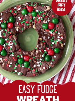 holiday fudge wreath with candied cherries and sprinkles on a green plate