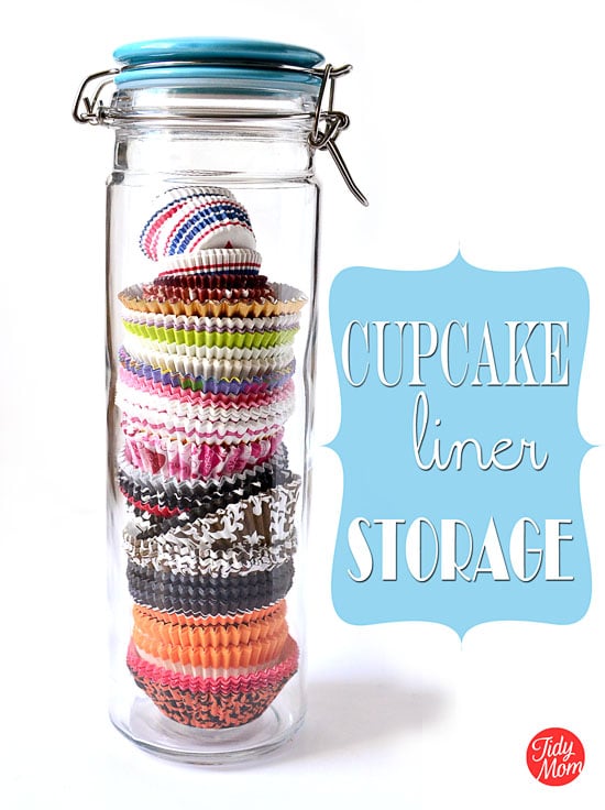 Clever and attractive storage solution. Use tall storage jars to organize and store cupcake liners! They keep their shape, easy to see what you have and look pretty on a shelf or counter!! find more on TidyMom.net