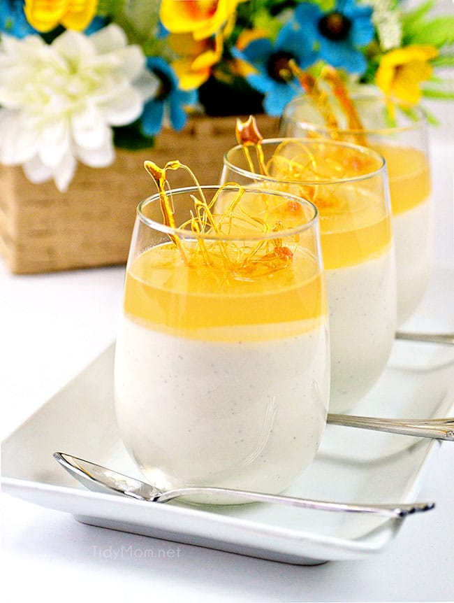 Honey Panna Cotta in glasses on a white tray with spoons