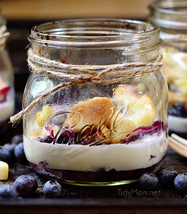 This lemon-blueberry bread pudding is not overly sweet and is one of the simplest desserts you can make! A zesty summer delight and comfort food at its finest with a punch of lemon and plump blueberries mixed throughout baked and served in your very own special jar makes it all the more decadent.