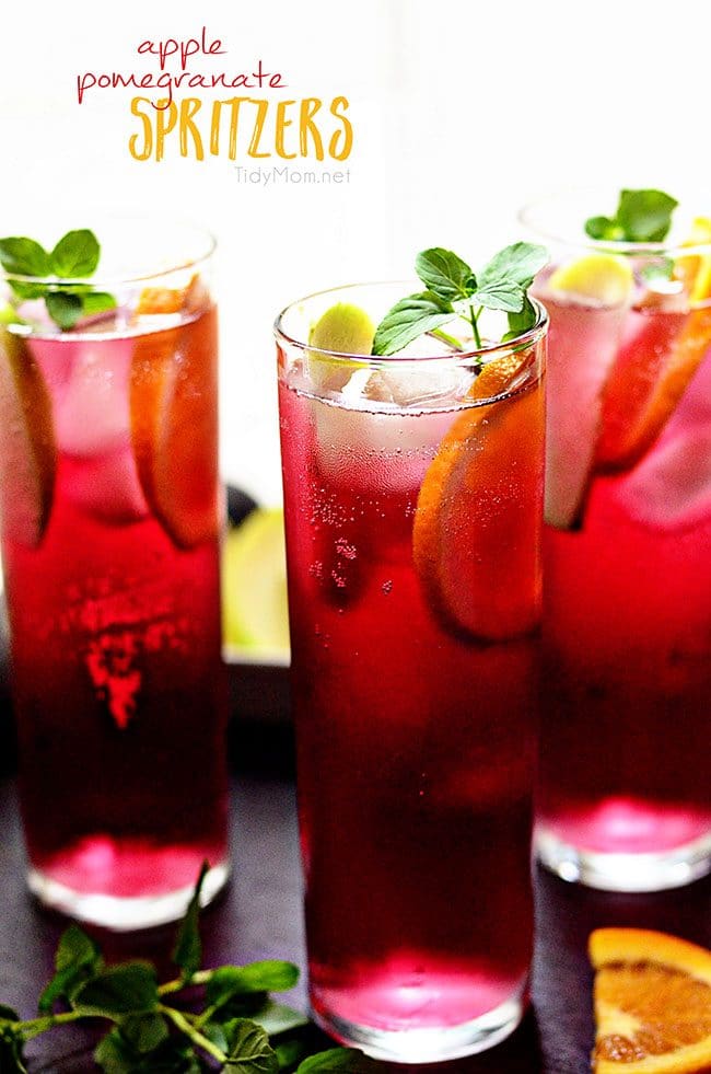 Delicious Apple Pomegranate Spritzers in tall skinny glasses