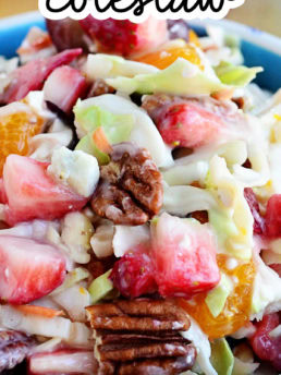 fruit and nuts coleslaw in a blue bowl
