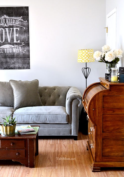 tufted back gray sofa at Tidymom