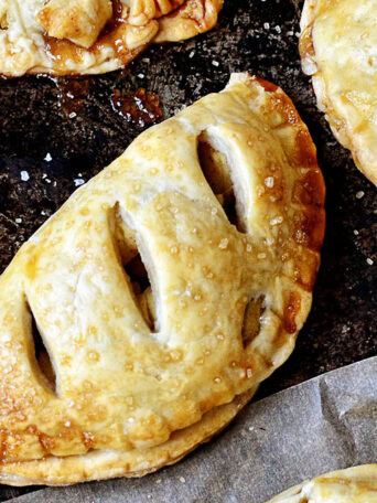 homemade hand pies on a dark pan