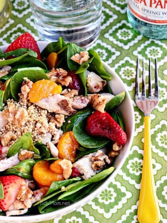 A hearty spring Strawberry Orange Spinach Salad with Quinoa is full of protein. Perfect for lunch or dinner on warm spring days. Print Full Recipe at TidyMom.net