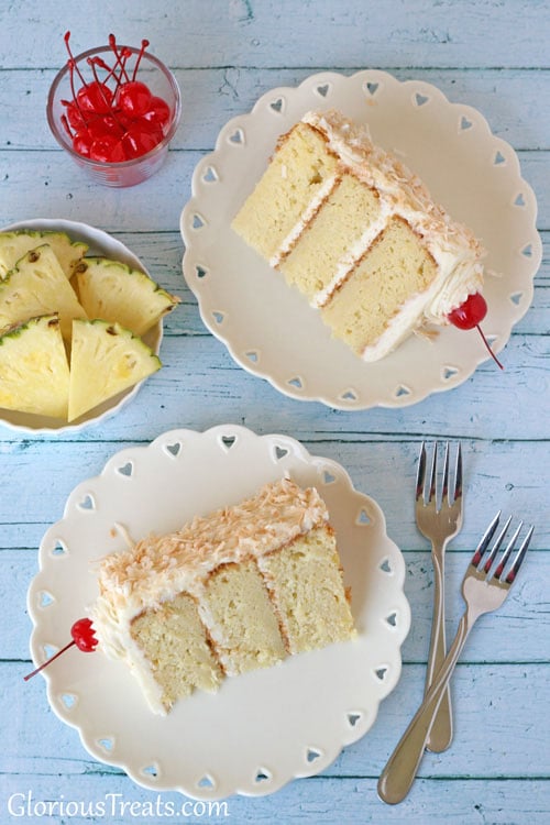 This cake has all the tropical flavors of a pina colada! Just like the favorite frozen cocktail, you will love the way the pineapple, coconut, and rum flavors take you right to paradise, right down to the cherry on top. Print the full cake and frosting recipe at TidyMom.net