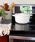 clean glass cooktop with white pot
