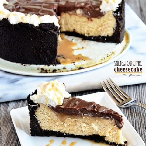 Caramel fans will be in heaven with this Salted Caramel Cheesecake recipe topped with a sticky caramel sauce, chocolate ganache and a sprinkle of sea salt. Print full recipe at TidyMom.net