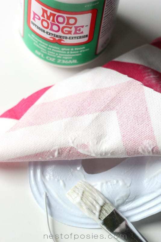 mod podge your fabric on the mask at TidyMom.net