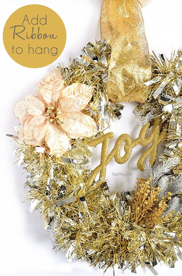 DIY Christmas Decor - Make this easy Tinsel Wreath in under 15 minutes and no glue required!  Tutorial at TidyMom.net