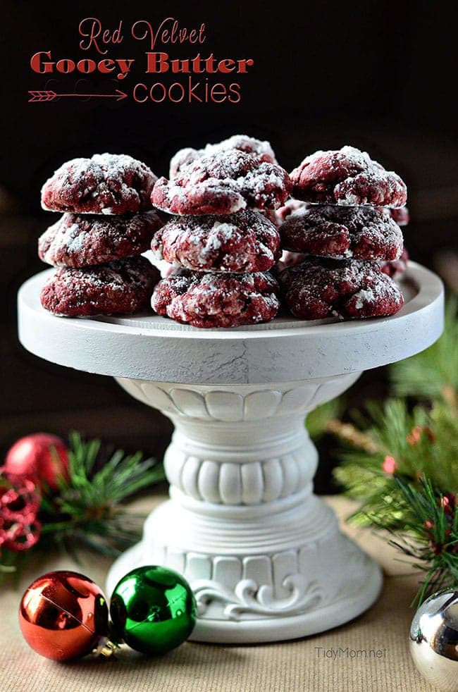Red Velvet Cookies stacked on a white stand
