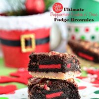 The Ultimate Peppermint Cookie Oreo Fudge Brownies. A peppermint sugar cookie bar is topped with a fudgy mint brownie and stuffed with a Holiday Oreo cookie for, without a doubt, one insanely decadent layer bar. Recipe at TidyMom.net