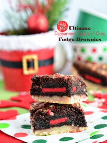 The Ultimate Peppermint Cookie Oreo Fudge Brownies. A peppermint sugar cookie bar is topped with a fudgy mint brownie and stuffed with a Holiday Oreo cookie for, without a doubt, one insanely decadent layer bar. Recipe at TidyMom.net