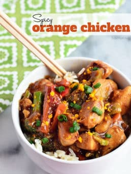 Easy Spicy Orange Chicken in a white bowl