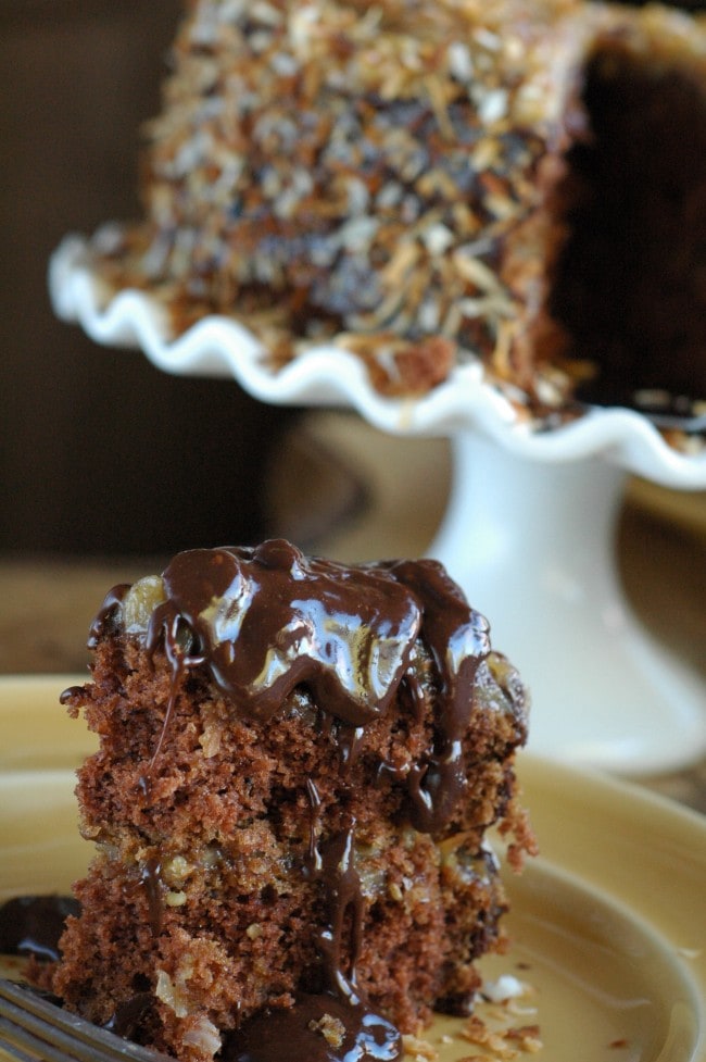 German Chocolate Cake infused with rum and toasted coconut! recipe at TidyMom.net