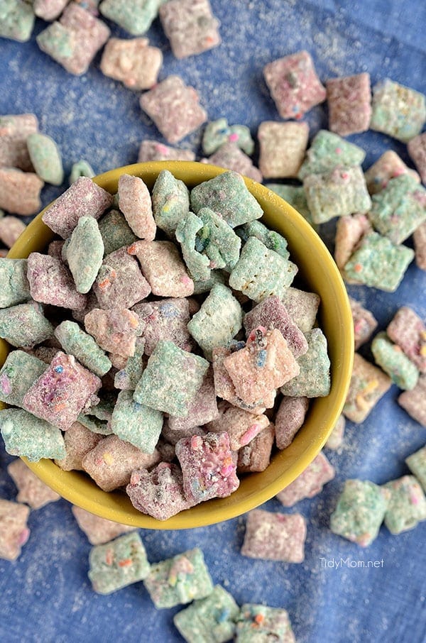 Cake Batter Puppy Chow snack mix recipe on a blue napkin