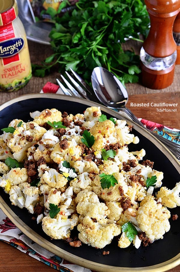 The BEST Roasted Cauliflower recipe on a black plate