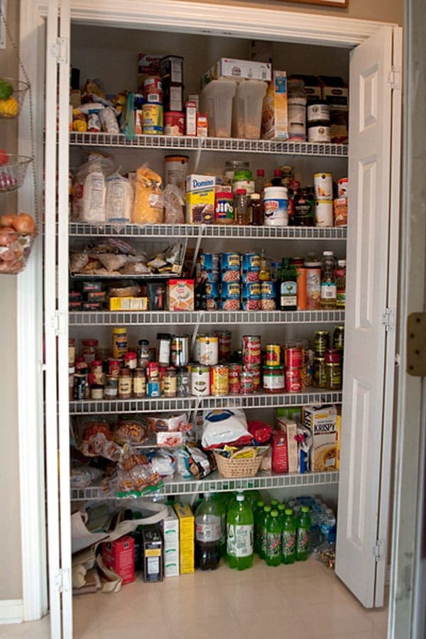 Cluttered pantry - before pantry organization at TidyMom.net