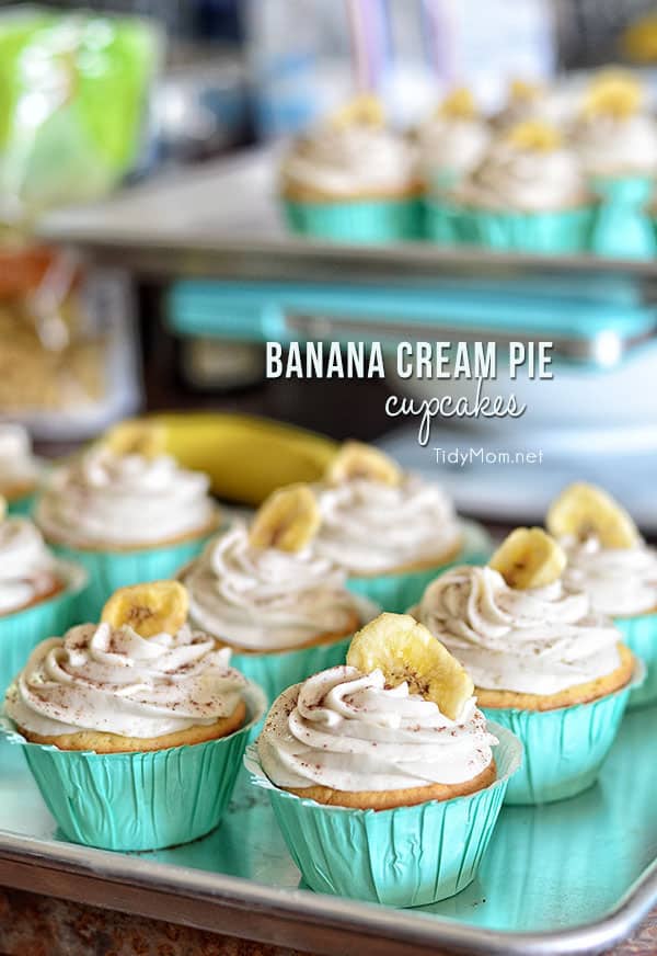 Light, tender vanilla cupcake filled with a luscious banana cream custard and topped with a banana buttercream.....reminiscent of banana cream pie. Print the full recipe for Banana Cream Pie Cupcakes at TidyMom.net 