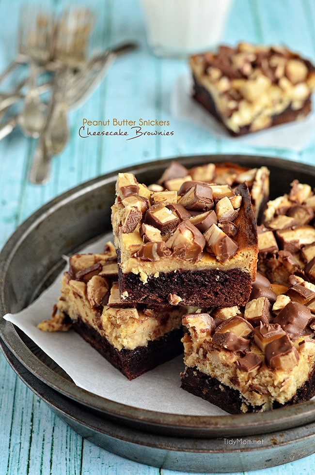 Peanut Butter Snickers Cheesecake Brownies absolutely sinful, just the way a brownie should be! recipe at TidyMom.net