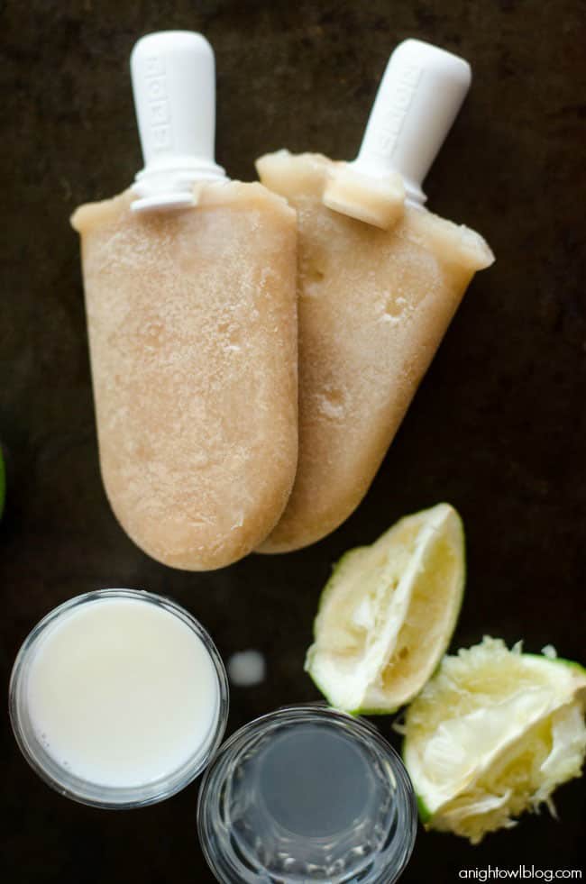 "Dirty" Coca-Cola Popsicles! The perfect summer flavor combo of Coke with a hint of lime, coconut and cream! You've got to try it! recipe at TidyMom.net