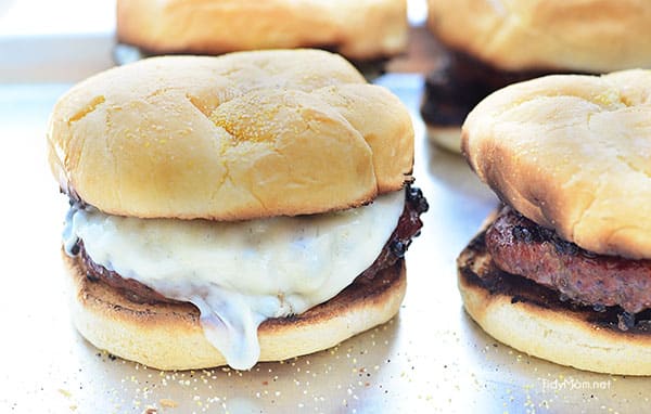 Plank Grilled Peppercorn and Provolone burgers. Recipe and video tutorial at TidyMom.net