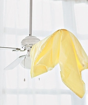 Clean ceiling fan with pillow case