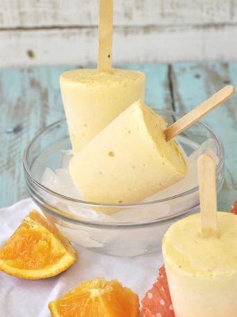 The delicious combination of vanilla ice cream and orange juice make a Creamy Orange Creamsicle- recipe at TidyMom.net