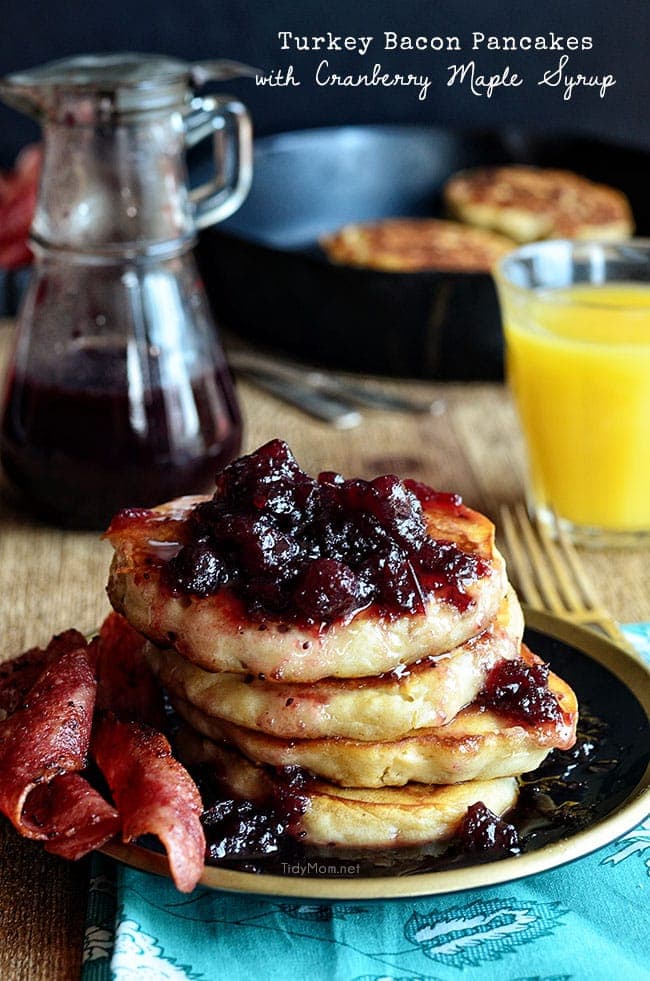 Get a layered taste explosion with Turkey Bacon Pancakes dripping in Cranberry Maple syrup.  The perfect tart, tangy, sweet and salty breakfast the whole family will love. Print recipe at TidyMom.net