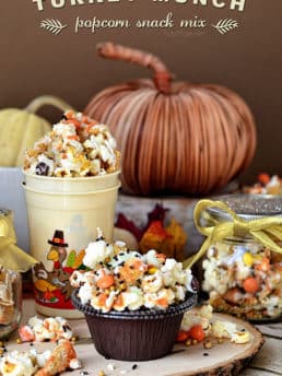 Turkey Munch - Fall Popcorn Snack Mix with bugles, reeses pieces and sprinkles all drizzled in white chocolate and pumpkin candy melts. Recipe at Tidymom.net