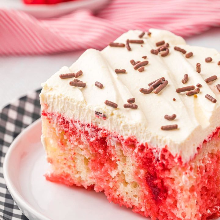 a serving of red and white poke cake