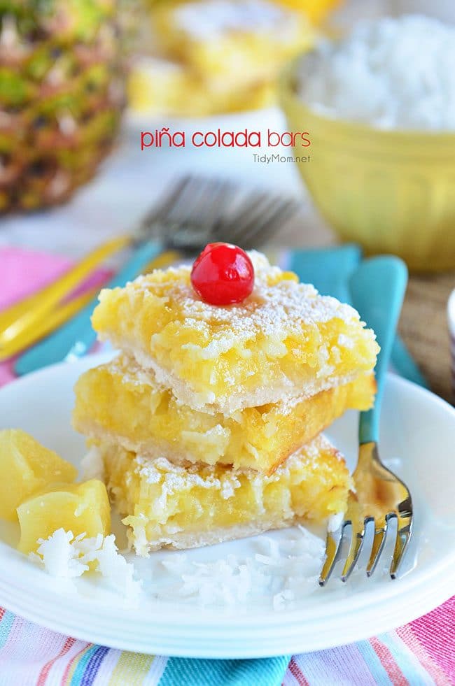 Channel the tropics, lounging on a white sandy beach, with these Pina Colada Bars. Enjoy the flavors of coconut and pinaple and consider it your ticket to a mental tropical paradise. grab the recipe at TidyMom.net