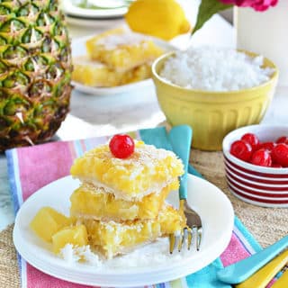 Channel the tropics, lounging on a white sandy beach, with these Pina Colada Bars. Enjoy the flavors of coconut and pinaple and consider it your ticket to a mental tropical paradise. grab the recipe at TidyMom.net